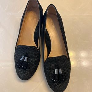 Nurture black heeled comfort with tassel details, leather lined. Size 8.5